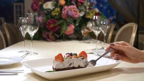 Restaurant Interior Saint Valentines Day of Plate with Cream Cake with Strawberry and Othe