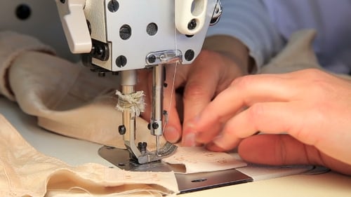 Sewing Machine Stitching Light Pink Fabric