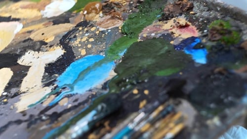 Artist Prepares Brushes and Palette before Creating Painting