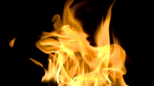 Close Up of Fiery Flames on Black Background
