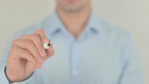 Man Writes 'No Money' on Clear Surface