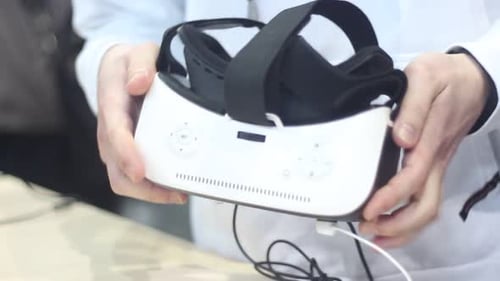 Close Up of VR Goggles in Person's Hands