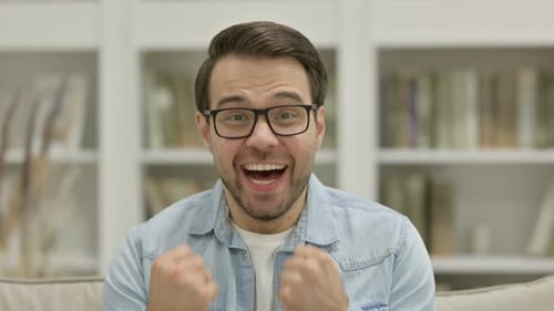Excited Man Reacts to Positive News
