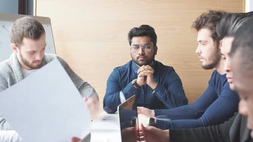 Diverse Team Working Together in Corporate Meeting