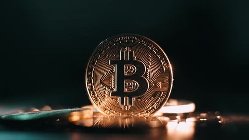 Bitcoin. Crypto Currency Gold Bitcoin BTC. Macro Shot of Bitcoin Coins Isolated on Black Background