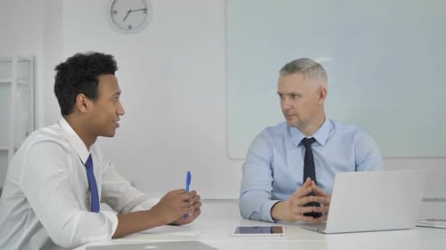 Businessmen Colleagues Having Business Talk in Office