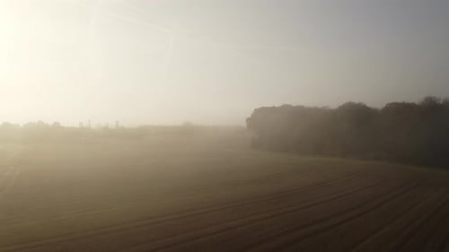 Drone View Of Morning Fog Over Fields