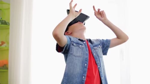 Boy Exploring Virtual Reality with VR Headset