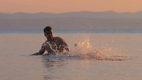Father and Son Swimming Together