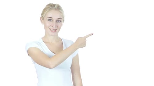 Woman Points to Blank Space on White Background