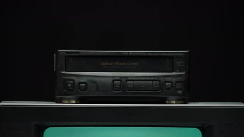 Taking Video Cassette From Recorder