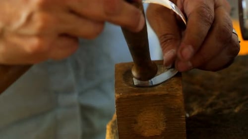 Craftswoman preparing ring