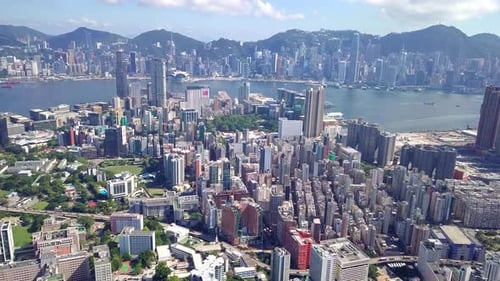 Drone fly over the Kowloon Peninsula in Hong Kong city