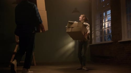 Joyful Man Relocating in New Apartment