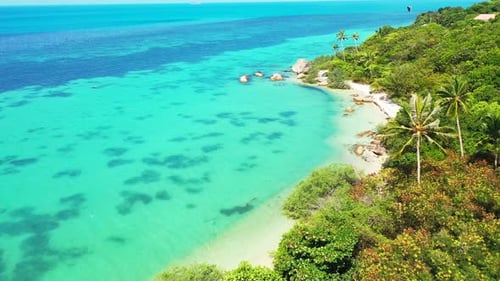 Koh Phangan, Thailand, tropical island with palm trees and sandy beach, aerial background