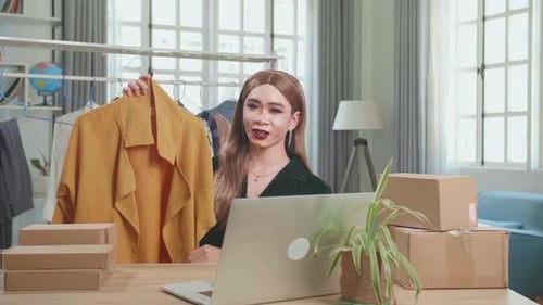 Asian Transgender Woman Selling Clothes Online By Live Streaming. Selling It Online Live Streaming