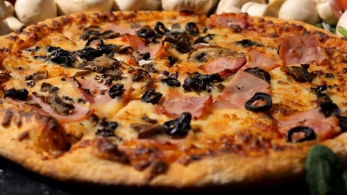 Mouthwatering Pizza with Mushroom and Black Olives