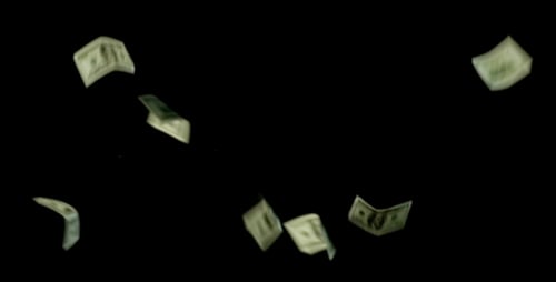 Money Falling on Black Background
