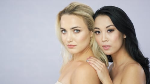 Blonde and Brunette Women in Studio