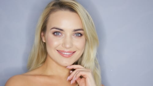 Smiling Blonde Model in Studio