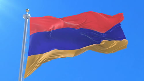 Realistic Armenian Flag Waving in the Wind on a Bright Blue Sky