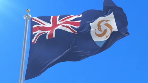 Realistic Anguilla Flag Waving Against a Clear Blue Sky