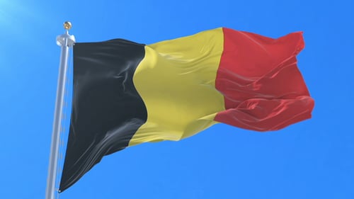 Realistic Waving Belgian Flag Against Blue Sky