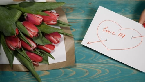 Tulip Bouquet with "Love" Message on Wooden Table
