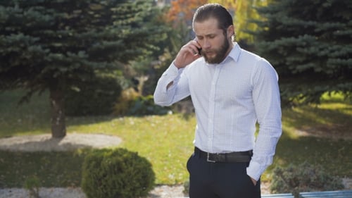 Man Talking on Phone Confronted in Park