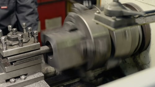 Metal Lathe Turning and Shaving Metal Rod