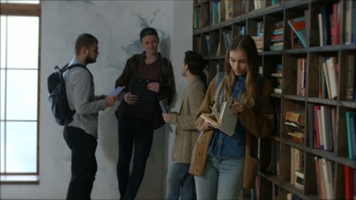 Beautiful Female Student Learning in Library