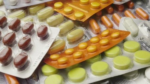 Pile of Colorful Pharmaceutical Pills and Capsules