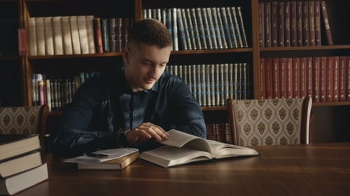 Young Adult Reading Book in Library
