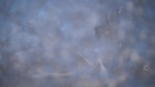 Frosty Ice Crystals Forming on Cold Glass