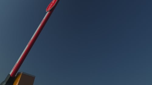 Closing Barrier Gate with STOP Sign