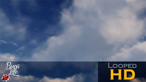 Time-Lapse White Clouds Moving Across Blue Sky