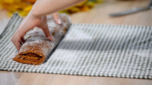 A Woman in the Kitchen to Prepare the Sweet Roll