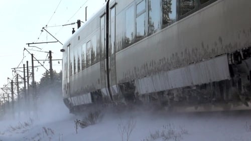 Passing Train in the Winter. Snowy Turbulence