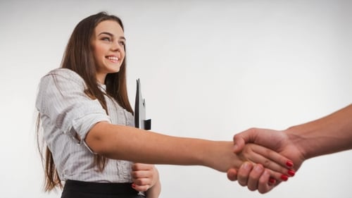 Business Woman Handshaking with an Other Person - Isolate Dover a White Background