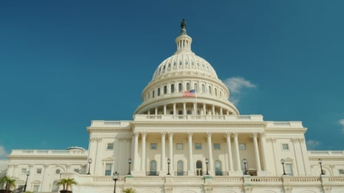 The Majestic Famous Capitol Building in Washington, DC. Against the Background of the Blue Sky