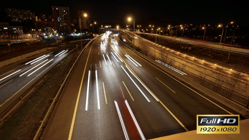 Highway Traffic Cars Driving at Multiple Lane Speedway