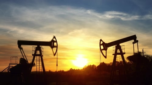 Pump Jacks Working at Dramatic Sunset