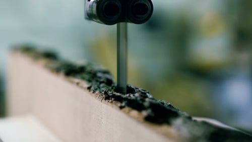 Band Saw Cuts Piece of Wood Close Up
