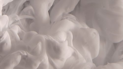 White Ink Dissolving Abstractly in Water