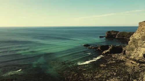 Seascape of the Atlantic Ocean bay with rocks above the water. Aerial view.