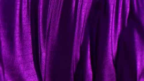 Dynamic Purple Fabric Waves Motion Background