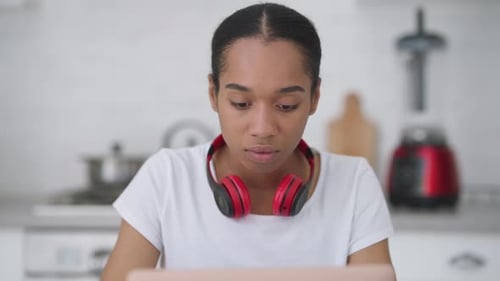 Portrait of Tired Troubled Woman Rubbing Eyes Looking at Laptop Screen in Home Office