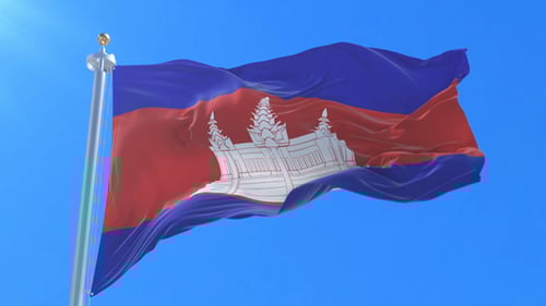 Realistic Flag of Cambodia Waving Against Blue Sky