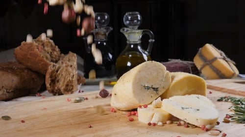 Restaurant Concept. Table Setting. Sliced Hard Cheeese Put on Wooden Background with Home Made Bread