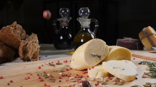 Restaurant Concept. Table Setting. Sliced Hard Cheeese Put on Wooden Background with Home Made Bread